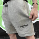 Spodenki Fear of God Essentials Sweatshort Dark Oatmeal – ujęcie z boku